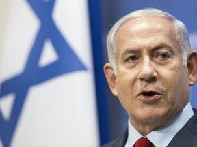 Israel's Prime Minister Benjamin Netanyahu speaks during a news conference following his meeting with Lithuania's Prime Minister Saulius Skvernelis at the government's headquarters in Vilnius, Lithuania, Thursday, Aug. 23, 2018.