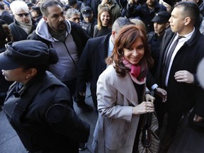 Senator and Former President Cristina Fernandez enters Congress, in Buenos Aires, Argentina Wednesday, Aug. 22, 2018. Lawmakers will vote on whether to authorize a judge to raid three properties belonging to the former president in ongoing graft scandal.