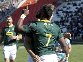 Siya Kolisi, of South Africa, celebrates after scoring a try during a rugby Championship match against Argentina, in Mendoza, Argentina, Saturday, Aug. 25, 2018.