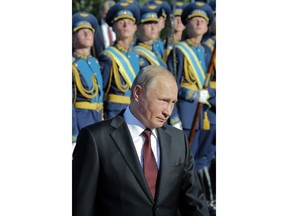 Russian President Vladimir Putin attends a laying ceremony in Kursk, 426 kilometers (266 miles) south of Moscow, Russia, Thursday, Aug. 23, 2018. Putin attended a ceremony marking the 75th anniversary of the battle of Kursk in which the Soviet army routed Nazi troops. It is described by historians as the largest tank battle in history involving thousands of tanks.