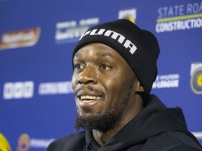 Jamaica's Usain Bolt at his press conference with the Central Coast Mariners soccer team in Newcastle, Tuesday, Aug. 21, 2018. Bolt, who holds the world records for the 100- and 200-meter sprints and is an eight-time Olympic gold medalist, is hoping to impress the coaching staff enough to earn a contract with the Mariners for the 2018-19 season in Australia's top-flight competition.