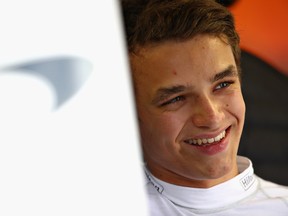 Lando Norris of Great Britain and McLaren F1 looks on in the garage during practice for the Formula One Grand Prix of Italy at Autodromo di Monza on August 31, 2018 in Monza, Italy.