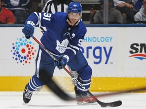 John Tavares of the Maple Leafs handles the puck against the Buffalo Sabres during an NHL pre-season game at Scotiabank Arena in Toronto on Friday night. The Leafs won 5-3, with Tavares scoring twice.