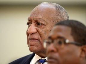 Actor and comedian Bill Cosby returns to the courtroom after a lunch break with his spokesman Andrew Wyatt  at the Montgomery County Courthouse, during his sexual assault trial sentencing  September 24, 2018 in Norristown, Pennsylvania.