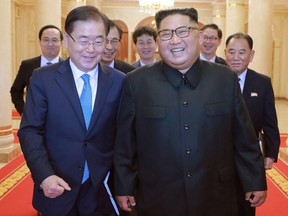 This picture from North Korea's official Korean Central News Agency (KCNA) taken on September 5, 2018 and released on September 6, 2018 shows North Korean leader Kim Jong Un (R) meeting with South Korean president's special envoy Chung Eui-yong (L) in Pyongyang.