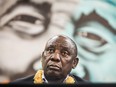 South African President Cyril Ramaphosa looks on during a meeting of the South African ruling party African National Congress (ANC) at the Nelson Mandela Youth Centre in Chatsworth township outside of Durban on September 8, 2018.