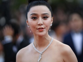 This file picture taken on May 8, 2018 shows Chinese actress Fan Bingbing posing as she arrives for the screening of the film "Todos Lo Saben (Everybody Knows)" and the opening ceremony of the 71st edition of the Cannes Film Festival in Cannes, southern France.