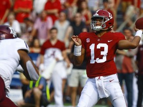 Alabama quarterback Tua Tagovailoa (13) throws a pass against Texas A&M during the first half of an NCAA college football game, Saturday, Sept. 22, 2018, in Tuscaloosa, Ala.