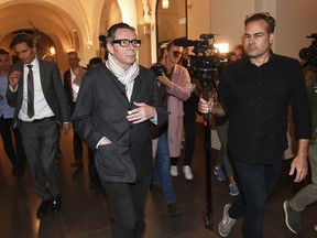 Jean-Claude Arnault arrives at the district court for the start of court proceedings in Stockholm, Wednesday, Sept.19, 2018.