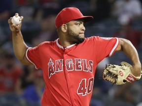 Los Angeles Angels starting pitcher Odrisamer Despaigne throws against the Seattle Mariners during the first inning of a baseball game in Anaheim, Calif., Thursday, Sept. 13, 2018.