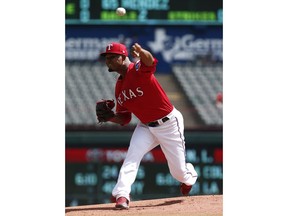 Texas Rangers starting pitcher Yohander Mendez delivers against the Tampa Bay Rays during the first inning of a baseball game Wednesday, Sept. 19, 2018, in Arlington, Texas.