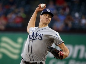 CORRECTS DATE Tampa Bay Rays starting pitcher Tyler Glasnow (20) pitches against the Texas Rangers during the first inning of a baseball game Monday, Sept. 17, 2018, in Arlington, Texas.