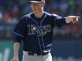 Tampa Bay Rays pitcher Ryan Yarbrough gestures to the umpire for a strike call against the Texas Rangers during the sixth inning of a baseball game Wednesday, Sept. 19, 2018, in Arlington, Texas.