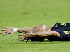 Juventus forward Cristiano Ronaldo reacts after receiving a red card during the Champions League, group H soccer match between Valencia and Juventus, at the Mestalla stadium in Valencia, Spain, Wednesday, Sept. 19, 2018.