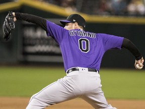 Colorado Rockies pitcher Adam Ottavino delivers to the Arizona Diamondbacks during a baseball game Sunday, Sept 23, 2018, in Phoenix.