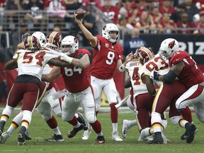 Arizona Cardinals quarterback Sam Bradford (9) throws against the Washington Redskins during the first half of an NFL football game, Sunday, Sept. 9, 2018, in Glendale, Ariz.