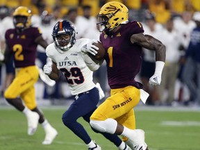 Arizona State wide receiver N'Keal Harry (1) runs to the end zone ahead of UTSA defensive back Clayton Johnson (29) on a 58-yard touchdown reception during the first half of an NCAA college football game, Saturday, Sept. 1, 2018, in Tempe, Ariz.