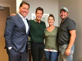 Bill Johnson, left, and his husband, Kraig Wiedenfeld, with surrogate Christina Fenn and her husband, Brian Fenn.