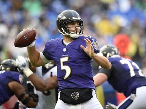 Baltimore Ravens quarterback Joe Flacco  prepares to throw to a receiver in the first half of an NFL football game against the Denver Broncos, Sunday, Sept. 23, 2018, in Baltimore.