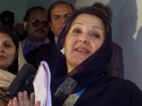 FILE - In this Dec. 9, 2000 file photo, Kulsoom Nawaz, wife of former Pakistani Prime Minister Nawaz Sharif, talks to reporters in Islamabad, Pakistan. The political party of the jailed former prime minister said his wife died before dawn Tuesday, Sept, 11, 2018, at a hospital in London after months in critical condition. She was 68. Arrangements were being made to bring her body back to Pakistan for burial.