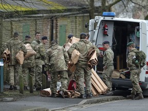 Military personnel outside Bourne Hill police station in Salisbury, England. Gavin Williamson told The Sunday Telegraph that the Government was drawing up a "defence Arctic strategy" with 800 commandos being deployed to Norway next year and the instalment of a base in the north of the country.