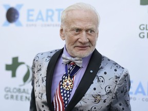 In this Feb. 28, 2018, file photo, Buzz Aldrin attends the 15th annual Global Green Pre-Oscar Gala, at NeueHouse Hollywood in Los Angeles.