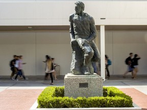 This Sept. 20, 2017 photo shows  "Prospector Pete" statue at  California State University, Long Beach, Calif.   The school will be ousting its "Prospector Pete" statue because of the impact the 1849 gold rush had on indigenous people. A statement on the university website says the gold rush was "a time in history when the indigenous peoples of California endured subjugation, violence and threats of genocide."