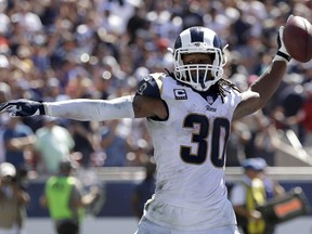 Los Angeles Rams running back Todd Gurley celebrates after scoring during the first half of an NFL football game against the Arizona Cardinals Sunday, Sept. 16, 2018, in Los Angeles.