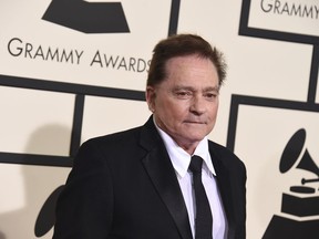 FILE - In this Feb. 15, 2016 file photo, Marty Balin arrives at the 58th annual Grammy Awards at the Staples Center in Los Angeles. Singer Balin of the Jefferson Airplane has died at age 76. Spokesman Ryan Romenesko said Balin died Thursday, Sept. 27, 2018, in Tampa, Fla., where he was on the way to the hospital. The cause of death was not immediately available.