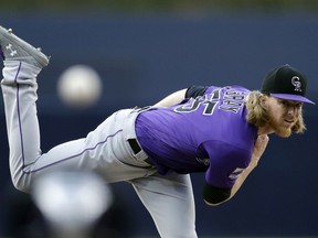 Colorado Rockies starting pitcher Jon Gray works against a San Diego Padres batter during the first inning of a baseball game Saturday, Sept. 1, 2018, in San Diego.