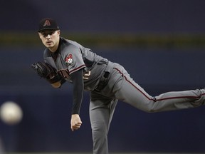 Arizona Diamondbacks starting pitcher Patrick Corbin works against a San Diego Padres batter during the first inning of a baseball game Friday, Sept. 28, 2018, in San Diego.