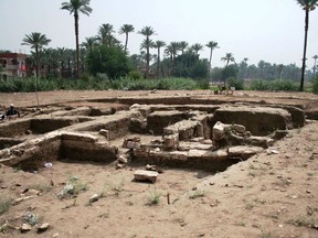 This undated photo released by the Egyptian Ministry of Antiquities, shows a large Roman bath and a chamber likely for religious rituals, that was recently discovered in the town of Mit Rahina, 20 kilometers, or 12 miles, south of Cairo, Egypt.  (Egyptian Ministry of Antiquities via AP)