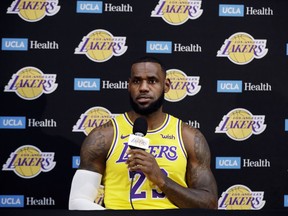 Los Angeles Lakers' LeBron James fields questions during media day at the NBA basketball team's practice facility Monday, Sept. 24, 2018, in El Segundo, Calif.