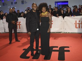 Julius Tennon, left, and Viola Davis attend the premiere for "Widows" on day 3 of the Toronto International Film Festival at Roy Thomson Hall on Saturday, Sept. 8, 2018, in Toronto.