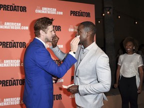 Boyd Holbrook, from left, Sterling K. Brown and Ryan Michelle Bathe attend a special screening of "The Predator" at Grauman's Egyptian Theatre on Wednesday, Sept. 12, 2018, in Los Angeles.