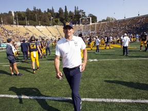 California head coach Justin Wilcox runs off the field following his team's 24-17 victory over North Carolina in an NCAA college football game, Saturday, Sept. 1, 2018, in Berkeley, Calif.