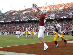 Stanford Cardinal tight end Colby Parkinson (84) catches a touchdown pass in front of Southern California cornerback Greg Johnson (9) during the first half of an NCAA college football game, Saturday, Sept. 8, 2018, in Stanford, Calif.