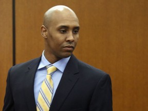 FILE - In this May 8, 2018, file photo, former Minneapolis police officer Mohamed Noor arrives at the Hennepin County Government Center for a hearing in Minneapolis. Noor is charged in the July 2017 shooting death of Justine Ruszczyk Damond, of Australia, who had called 911 to report a possible assault. Court records show psychiatrists and training officers voiced concerns about Noor's fitness for duty long before he fatally shot Damond.