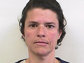 This September 2015 photo provided by the Iowa Department of Corrections shows Angel Stewart, who is the subject of a pending clemency petition to Iowa Gov. Kim Reynolds. Stewart was convicted of kidnapping in both Missouri and Iowa following the 1994 abduction and killing of two elderly Iowa women. Her advocates say Stewart has an IQ of 65 and was abused by the men responsible for the crime. They say she went along only out of fear and played no direct role in the kidnappings or killings. (Iowa Department of Corrections via AP)