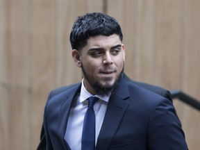 Houston Astros' Roberto Osuna arrives at a Toronto court on Tuesday, September 25, 2018. The former Toronto Blue Jays pitcher agreed to a peace bond that led to the withdrawal of an assault charge against him.