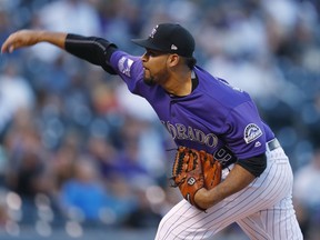 Colorado Rockies starting pitcher Antonio Senzatela works against the Arizona Diamondbacks in the first inning of a baseball game, Tuesday, Sept. 11, 2018, in Denver.