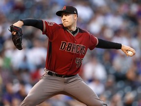 Arizona Diamondbacks starting pitcher Patrick Corbin works against the Colorado Rockies in the first inning of a baseball game Wednesday, Sept. 12, 2018, in Denver.