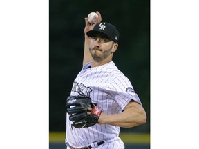 Colorado Rockies starting pitcher Chad Bettis throws against the Philadelphia Phillies during the first inning of a baseball game on Tuesday, Sept. 25, 2018, in Denver.