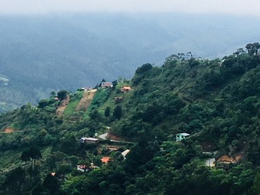 Homes are perched in the Talamanca Mountain Range.