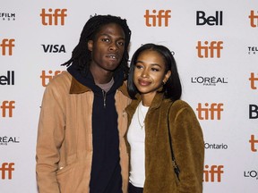 An array of musicians representing diverse sounds and experiences from across the country are in the running for the Polaris Music Prize tonight. Canadian musician Daniel Caesar, left, arrives ahead of the screening of "MID90s" during the Toronto International Film Festival in Toronto, on Sunday, September 9, 2018.