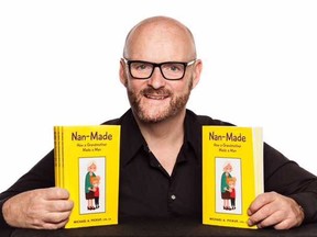 Michael Pickup poses with copies of his book "Nan-Made" in this undated handout photo. Michael Pickup describes his grandmother as a superhero, a friend, and "everything and more than people traditionally think of a grandmother." Though he's more well-known for writing reports as Nova Scotia's auditor general, Pickup recently decided to try his hand at authorship, penning a 150-page book about lessons he learned from Nan Pickup.