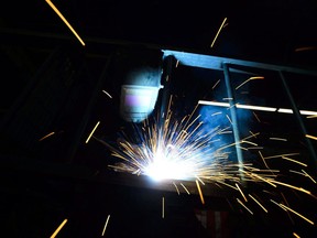 Statistics Canada says the economy grew by 0.2 per cent in July, boosted by strength in the manufacturing sector. The increase followed essentially no change in the country's real gross domestic product in June. A welder fabricates a steel structure at an iron works facility in Ottawa on Monday, March 5, 2018.