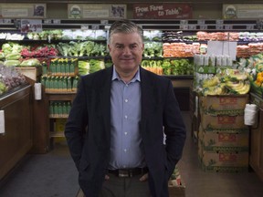 The parent company of grocery chain Sobeys Inc. says it has reached a deal to acquire food retailer Farm Boy in a bid to expand its reach in Ontario. Farm Boy CEO Jeff York poses for a photo in an Ottawa store on Thursday, May 26, 2016.