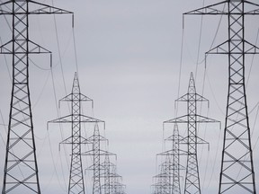 Manitoba Hydro power lines are photographed just outside Winnipeg, Monday, May 1, 2018. Manitoba RCMP have called in outside investigators to probe alleged assaults linked to hydro development projects in the province's north during the 1960s.