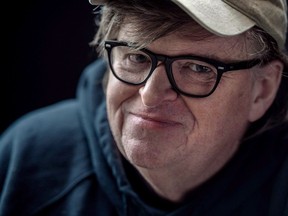 If things go awry for Michael Moore following the release of his latest politically charged documentary, the progressive provocateur says he has a plan to escape potential persecution in the U.S.: He's moving to Canada. Film director Michael Moore poses for a portrait while promoting his new movie, "Fahrenheit 11/9," during the Toronto International Film Festival in Toronto, Saturday, September 8, 2018.THE CANADIAN PRESS/Galit Rodan